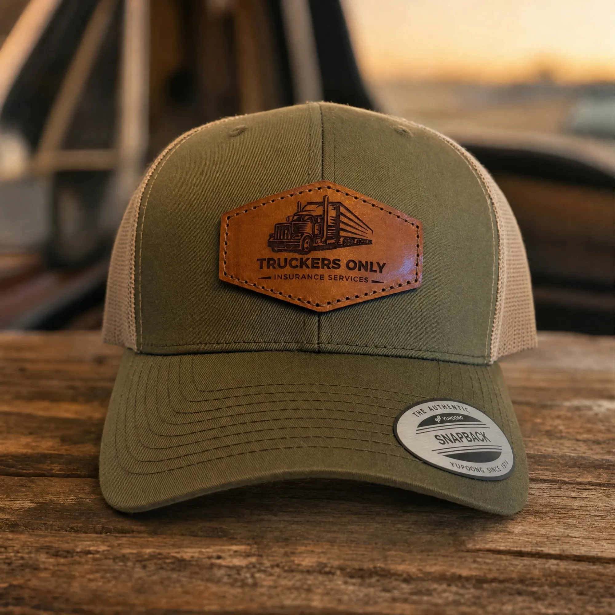 2026 Truckers Only cap, front on, showing the stitched leather patch
